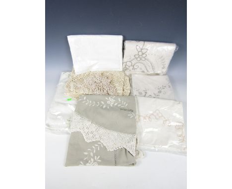 A quantity of vintage textiles including tablecloths etc