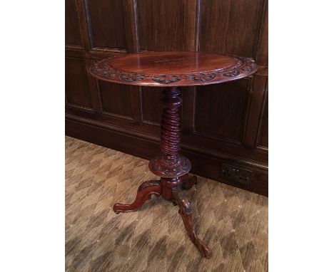 A reproduction Victorian tripod wine / tea table