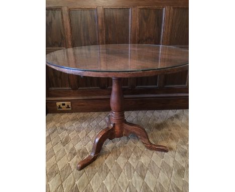 A Victorian oak snap-top tripod tea table