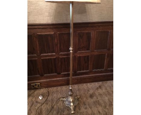 A brass standard lamp