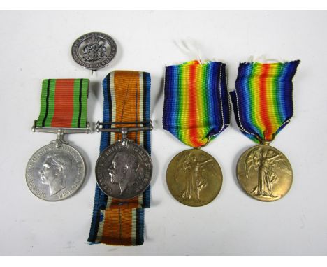 A British War and Victory medal pair to 209595 Dvr W Samwell, RA, a Victory medal to 266687 Pte E J Ansell, Oxf and Bucks Lig