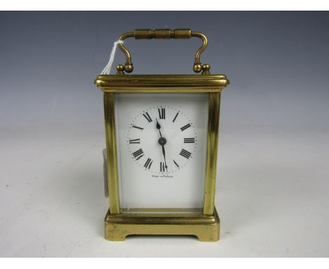 A 20th Century French carriage clock, 11 cm excluding handle