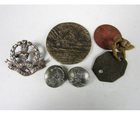 A Lusitania medal together with a Middlesex Regiment cap badge, identity disc and two Victorian light infantry volunteers but