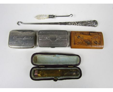 A Victorian gilt cigarette holder in claret Morocco case, together with a burr wood snuff box, a John Taylor of Glasgow and K