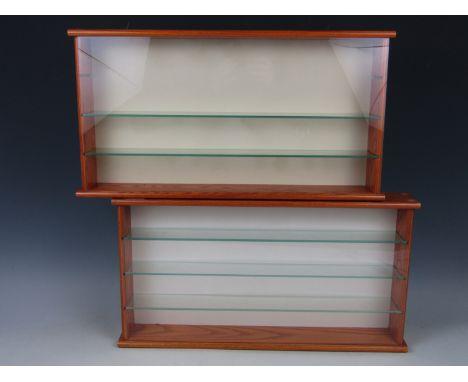 Two small display cases for model cars