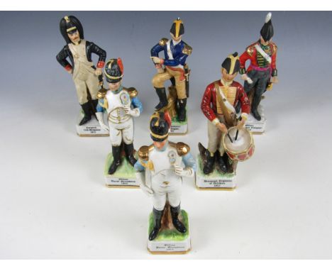 A collection of six ceramic military figures