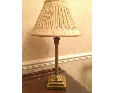 A brass columnar table lamp