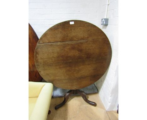 A Victorian oak snap-top tripod tea table