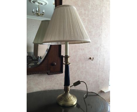 A black and gilt table lamp