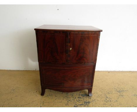 A George III string inlaid and cross banded mahogany bow fronted chest commode