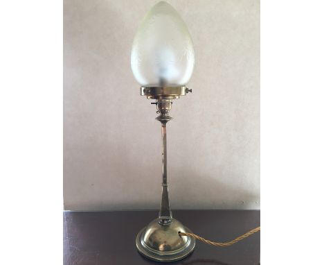 A George V brass table lamp with later glass shade