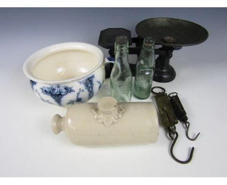 A quantity of Victorian domestic bygones including two spring balances, a Penrith Cod's patent bottle with one other, cast ir