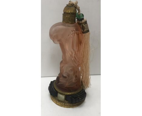 An early 20th Century Austrian frosted pink glass figure of a hawk as a scent bottle with gilt metal mounts on a clear froste