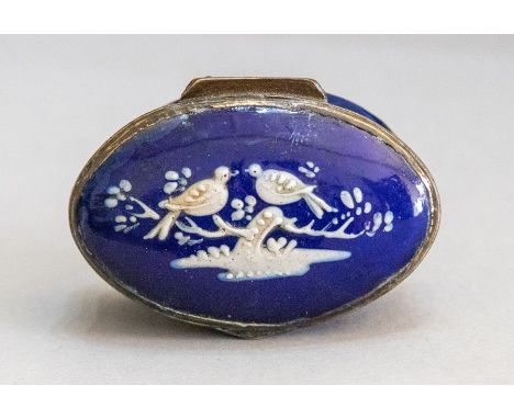 A Bilston deep blue enamel patch box, circa 1780, the cover with two love birds in raised white enamel, width 5cm