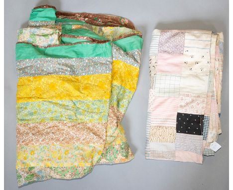 A Victorian patchwork quilt in an assortment of colours and various designs, torn in places, repairable, 3/4 bed size, the un