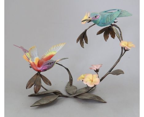 An Albany Fine China Co. ceramic bird study incorporating metal. Modelled as a two Hummingbirds. Factory mark to metal base. 