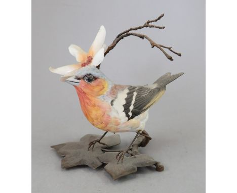 An Albany Fine China Co. ceramic bird study incorporating metal. Modelled as a Chaffinch. Factory mark to metal base. 10 cm t