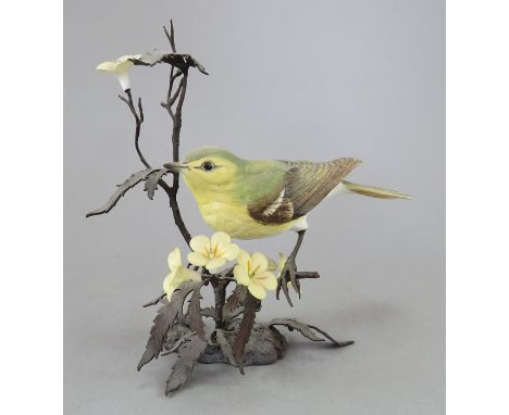 An Albany Fine China Co. ceramic bird study incorporating metal. Modelled as a Yellow Wagtail. Factory mark to metal base. 14