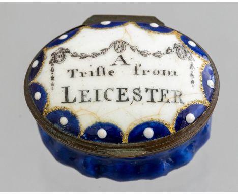 A Bilston enamel oval patch box, circa 1780, the cover with motto A Trifle from Leicester, jewelled border, width 4cm&nbsp;
