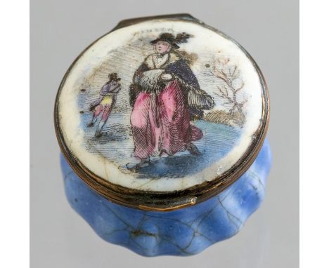 A Bilston circular enamel patch box, circa 1790, the cover with a figure representing Winter, diameter 3.5cm 