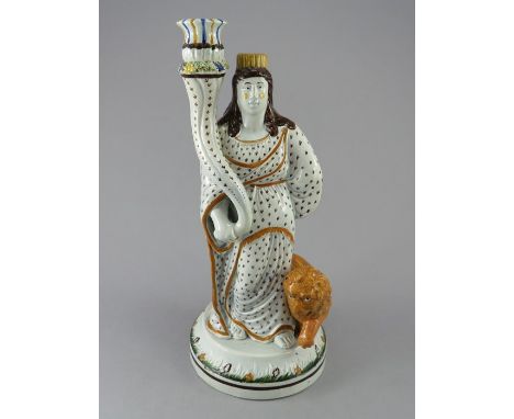 An early nineteenth century pearlware Staffordshire Pratt figure, c.1810. It is decorated in the so-called Pratt palette of g