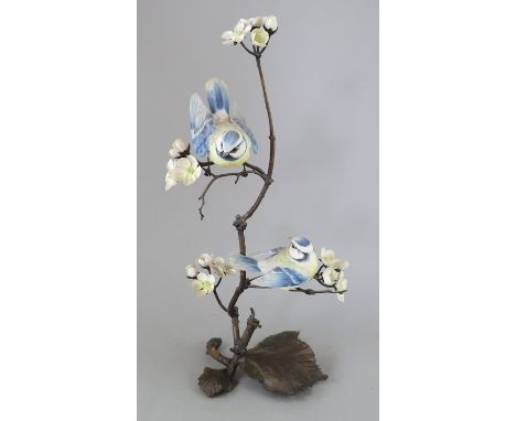 An Albany Fine China Co. ceramic bird study incorporating metal. Modelled as two Blue Tits. Factory mark to metal base. 35 cm