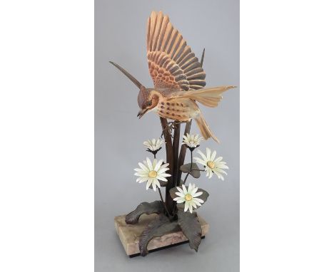 An Albany Fine China Co. ceramic bird study incorporating metal. Modelled as a Sky Lark by David Burnham-Smith. Factory mark 