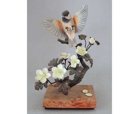 An Albany Fine China Co. ceramic bird study incorporating metal. Modelled as a Great Tit. Factory mark to base. 24 cm tall. (