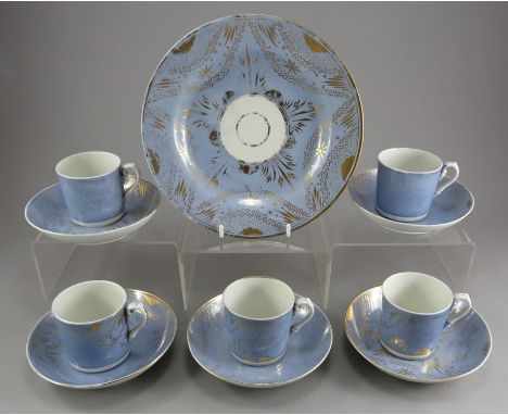 An early nineteenth century Miles Mason porcelain part tea service, c.1820. It is decorated with gilded swags on a light blue