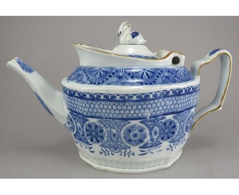 An early nineteenth century blue and white transfer-printed Swansea Cambrian teapot and cover, c.1815. It has a hinge lid wit