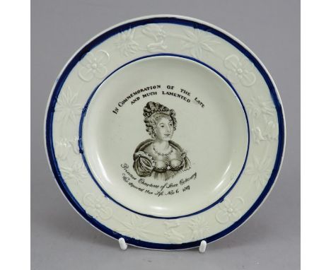 An early nineteenth century commemorative brown and white transfer-printed moulded child's plate, c.1817. It is decorated wit