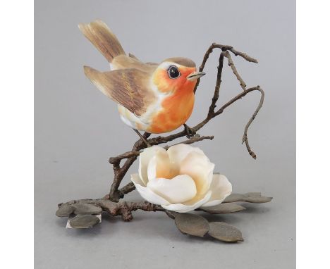 An Albany Fine China Co. ceramic bird study incorporating metal. Modelled as a Robin. Factory mark to metal base. 10 cm tall.