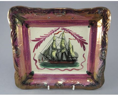 An early nineteenth century Sunderland lustre transfer-printed plaque, c.1830-40. It is decorated with a ship print with enam