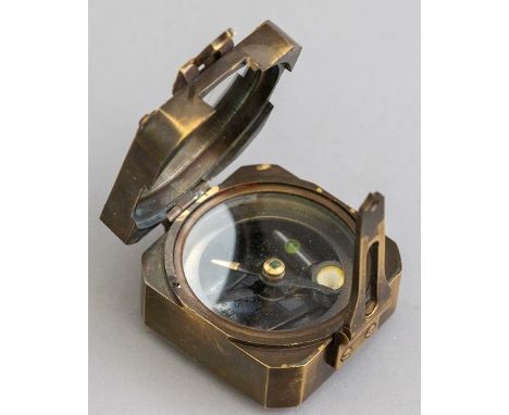 A metal field pocket compass, marked Kelvin & Hughes and bearing date 1917, width 5.5cmCondition: generally good overall