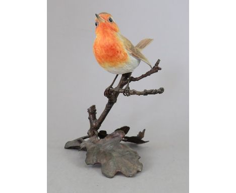 An Albany Fine China Co. ceramic bird study incorporating metal. Modelled as a Robin. Factory mark to metal base. 14 cm tall.