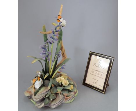A Boehm of Malvern ceramic study titled; 'Spring Flowers with Orange Tip Butterflies. Factory mark to metal base. Limited edi