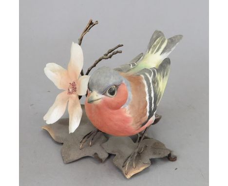 An Albany Fine China Co. ceramic bird study incorporating metal. Modelled as a Chaffinch. Factory mark to metal base. 8 cm ta