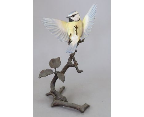 An Albany Fine China Co. ceramic bird study incorporating metal. Modelled as a Blue Tit. Factory mark to metal base. 20 cm ta