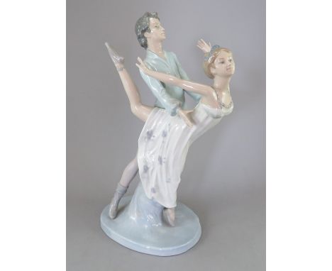 A Nao by Ladro figure of a dancing couple. Factory mark to base. 33 cm tall. (1)Condition: In good overall condition. Provena