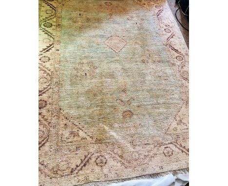 An antique wash wool Ziegler carpet, approximately 250 by 182cm