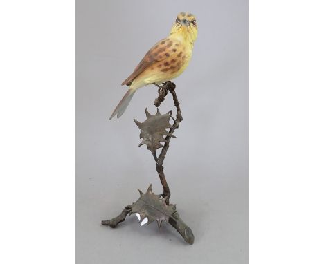 An Albany Fine China Co. ceramic bird study incorporating metal. Modelled as a Yellow Bunting. Factory mark to metal base. 20