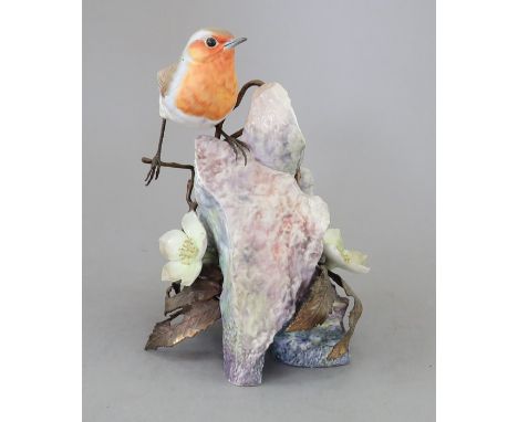 An Albany Fine China Co. ceramic bird study incorporating metal. Modelled as a Robin, Christmas 1992. Factory mark to base. 1