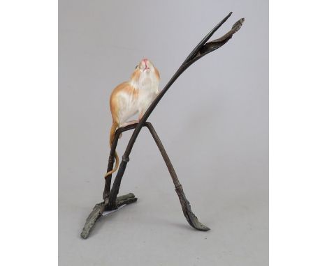 An Albany Fine China Co. ceramic study incorporating metal. Modelled as a Water Vole. Factory mark to metal base. 16 cm tall.