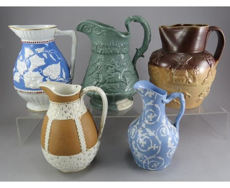 A group of early nineteenth century stoneware relief moulded jugs, c.1830-50. To include: a green Ridgway Tam O'Shanter jug, 