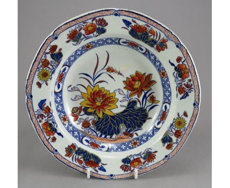 An early nineteenth century blue and white transfer-printed soup dish with the water lily pattern, c.1815. It has enamel colo