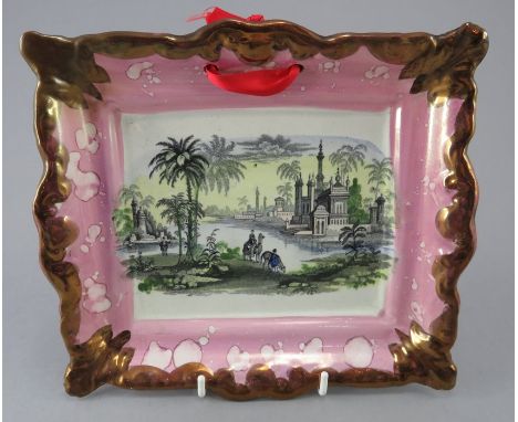 An early nineteenth century Sunderland lustre transfer-printed plaque, c.1830-40. It is decorated with a Arabian-type print w