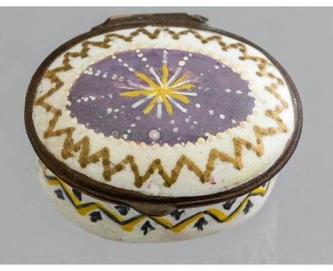 A Bilston enamel oval patch box, circa 1790, jewelled cover with a chevron border, width 4.5cm&nbsp;