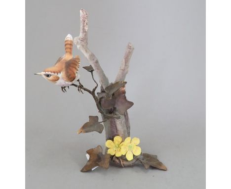 An Albany Fine China Co. ceramic bird study incorporating metal. Modelled as a Wren. Factory mark to metal base. 17 cm tall. 
