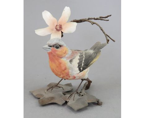 An Albany Fine China Co. ceramic bird study incorporating metal. Modelled as a Chaffinch. Factory mark to metal base. 11 cm t