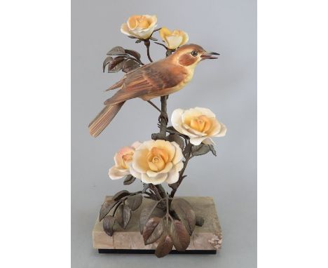 An Albany Fine China Co. ceramic bird study incorporating metal. Modelled as a Nightingale by David Burnham-Smith. Factory ma